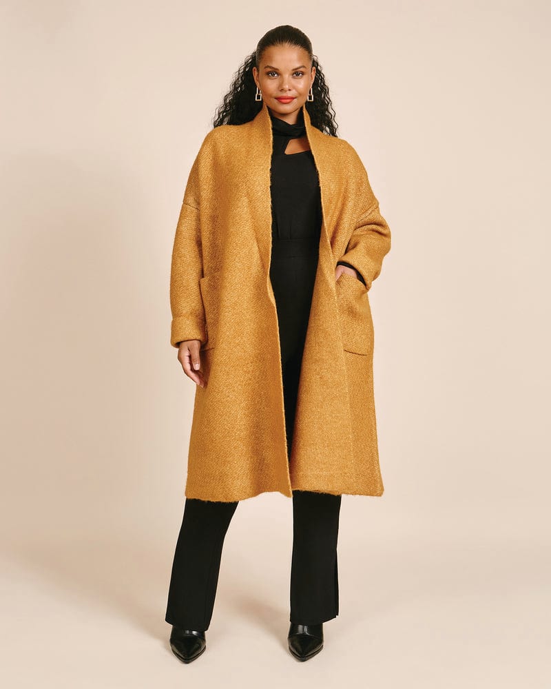 Plus size model wearing Cora Sweater Coat by 11 Honoré Collection | Dia&Co | dia_product_style_image_id:199826